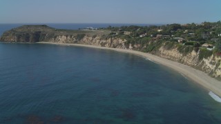 4K aerial stock footage ascend near coastal mansion, Dume Cove, Malibu, California Aerial Stock Footage | DCA05_130