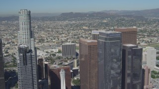 4K aerial stock footage of flying by city skyscrapers in Downtown Los Angeles, California Aerial Stock Footage | DCA06_013