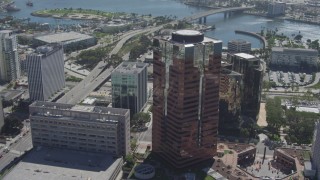 4K aerial stock footage tilt from office building to reveal RMS Queen Mary, Downtown Long Beach, California Aerial Stock Footage | DCA06_020