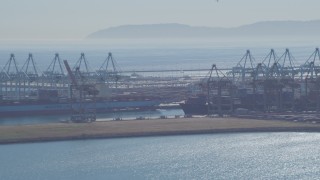 4K aerial stock footage flyby cargo ships, containers and cranes, Port of Los Angeles, San Pedro, California Aerial Stock Footage | DCA06_042