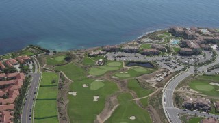 4K aerial stock footage flyby a resort and golf course on the coast in Rancho Palos Verdes, California Aerial Stock Footage | DCA06_054