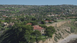 4K aerial stock footage orbit a mansion on a cliff, overlooking ocean in Palos Verdes Estates, California Aerial Stock Footage | DCA06_057