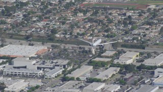 4K aerial stock footage of a cargo jet coming in for landing, LAX (Los Angeles International Airport), Los Angeles, California Aerial Stock Footage | DCA06_061