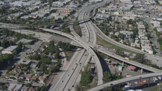 DCA06_066 - 4K aerial stock footage tilt to bird's eye view of light traffic on freeway interchange, Mar Vista, California