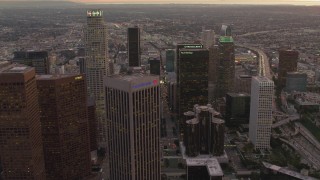 4K aerial stock footage of flying by Downtown Los Angeles skyscrapers, California, sunset Aerial Stock Footage | DCA07_007