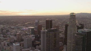 4K aerial stock footage of flying by Downtown Los Angeles skyscrapers, California, sunset Aerial Stock Footage | DCA07_008