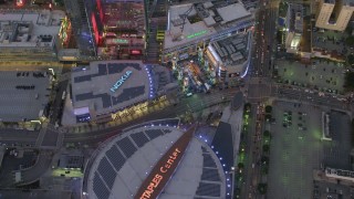 DCA07_019 - 4K aerial stock footage of orbiting Staples Center, Nokia Theater and LA Live, Downtown Los Angeles, California, twilight