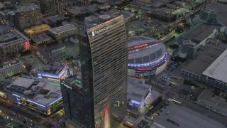 DCA07_020 - 4K aerial stock footage of orbiting The Ritz-Carlton, Downtown Los Angeles, California, twilight