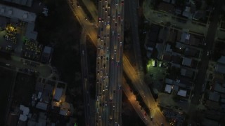 DCA07_034 - 4K aerial stock footage of bird's eye view flying over Highway 101, heavy traffic, Silverlake, California, night