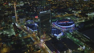 DCA07_057 - 4K aerial stock footage of flying by The Ritz-Carlton, Nokia Theater, Staples Center, Downtown Los Angeles, California, night