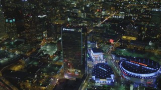 DCA07_058 - 4K aerial stock footage of The Ritz-Carlton, Nokia, Theater, Staples Center, reveal skyscrapers, Los Angeles, California, night