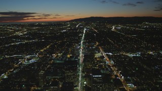 4K aerial stock footage of following Wilshire Blvd through Koreatown to Century City, Los Angeles, California, night Aerial Stock Footage | DCA07_067