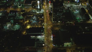 DCA07_086 - 4K aerial stock footage of following Sunset Blvd, revealing Cinerama Dome, Hollywood, California, night