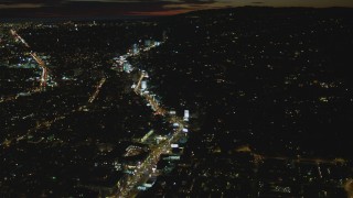 4K aerial stock footage of following Sunset Blvd, approaching Sunset Strip, West Hollywood, California, night Aerial Stock Footage | DCA07_092