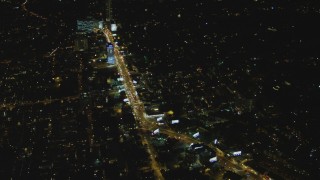 4K aerial stock footage of flying by Sunset Strip, West Hollywood, California, night Aerial Stock Footage | DCA07_095