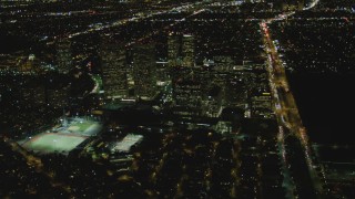 4K aerial stock footage of approaching skyscrapers, Century City, California, night Aerial Stock Footage | DCA07_097