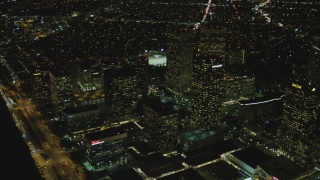 4K aerial stock footage of flying away from skyscrapers, Century City, California, night Aerial Stock Footage | DCA07_101