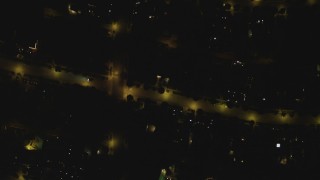 DCA07_106 - 4K aerial stock footage of a bird's eye view of residential neighborhoods, Beverly Hills, California, night