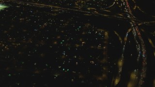 DCA07_119 - 4K aerial stock footage of Interstate 710 and Interstate 105 interchange, Lynwood, California, night