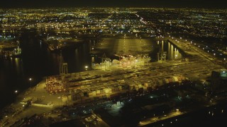 4K aerial stock footage of cargo containers, cranes, Port of Long Beach, California, night Aerial Stock Footage | DCA07_131