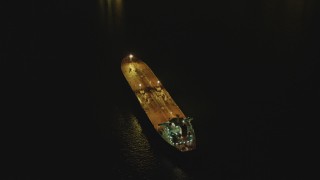 4K aerial stock footage of orbiting an oil tanker sailing near Port of Long Beach, California, night Aerial Stock Footage | DCA07_147