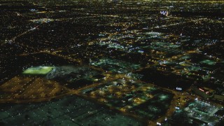 DCA07_167 - 4K aerial stock footage of a passenger jet approaching LAX (Los Angeles International Airport), Los Angeles, California, night