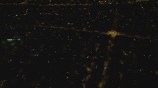 4K aerial stock footage of approaching an intersection, residential neighborhood, Woodland Hills, California, night Aerial Stock Footage | DCA07_180