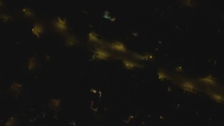 4K aerial stock footage of a bird's eye view of a residential neighborhood, Woodland Hills, California, night Aerial Stock Footage | DCA07_185