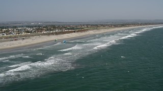 DCA08_028 - 4K aerial stock footage orbit kite surfers near the beach, Coronado, California