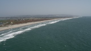 DCA08_030 - 4K aerial stock footage flyby a beachside military complex in Chula Vista, California