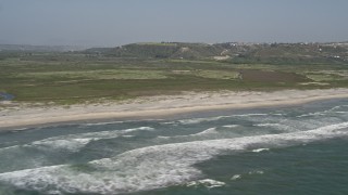 DCA08_037 - 4K aerial stock footage of a nature preserve and a beach in Imperial Beach, California