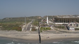 DCA08_040E - 4K aerial stock footage approach and follow the border fence on the US/Mexico Border, Tijuana