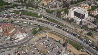 DCA08_051 - 4K aerial stock footage tilt to a bird's eye view of heavy traffic on the US/Mexico Border, Tijuana