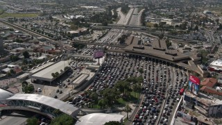 DCA08_057E - 4K aerial stock footage orbit heavy traffic waiting at the US/Mexico Border, Tijuana