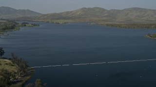 4K aerial stock footage fly over a water treatment plant to reveal Lower Otay Lake, California Aerial Stock Footage | DCA08_108