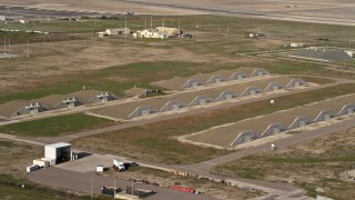 4K aerial stock footage of bunkers at an island military base, Naval Air Station North Island, California Aerial Stock Footage | DCA08_171