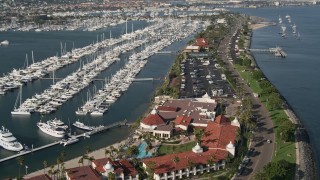 4K aerial stock footage of an oceanfront hotel and marina on Shelter Island, California Aerial Stock Footage | DCA08_174