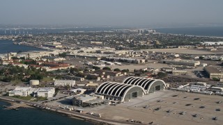 DCA08_180 - 4K aerial stock footage of an island military base, Naval Air Station North Island, California