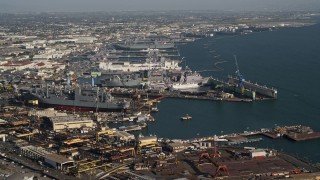 4K aerial stock footage of naval warships under construction in San Diego, California Aerial Stock Footage | DCA08_190