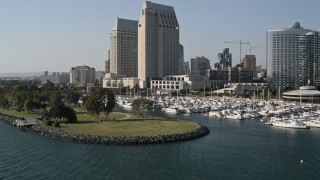 4K aerial stock footage of low altitude flyby of waterfront hotels and marina, Downtown San Diego, California Aerial Stock Footage | DCA08_194