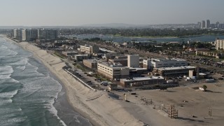 DCA08_208 - 4K aerial stock footage of an oceanfront military base, Naval Amphibious Base, Coronado, California