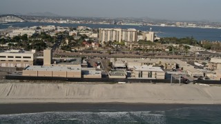 4K aerial stock footage orbit a beachside military base, Naval Amphibious Base, Coronado, California Aerial Stock Footage | DCA08_209