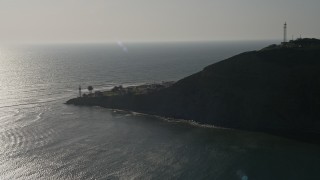 4K aerial stock footage of flying toward an oceanfront lighthouse, Point Loma, California Aerial Stock Footage | DCA08_218