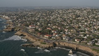 4K aerial stock footage of coastal Neighborhoods near cliffs, Point Loma, California Aerial Stock Footage | DCA08_227