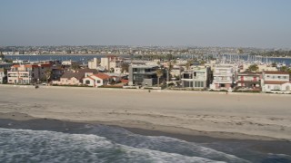 4K aerial stock footage of flying by beachfront condominiums, Mission Beach, California Aerial Stock Footage | DCA08_233