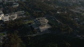 DCA08_262 - 4K aerial stock footage orbit a campus library, University of California, San Diego, California