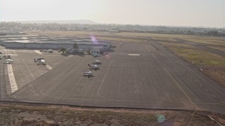 4K aerial stock footage approach a small airfield for landing, Montgomery Field, California Aerial Stock Footage | DCA08_269