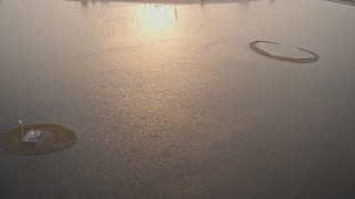 DCA08_287 - 4K aerial stock footage video of small islands in a bay, Mission Bay, California, Sunset