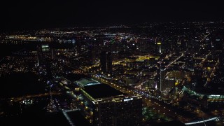 4K aerial stock footage of skyscrapers, hotels, convention center and stadium in Downtown San Diego, California, at night Aerial Stock Footage | DCA08_344