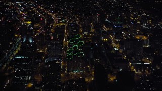 4K aerial stock footage orbit city buildings and tilt to skyscrapers, Downtown San Diego, California, Night Aerial Stock Footage | DCA08_347